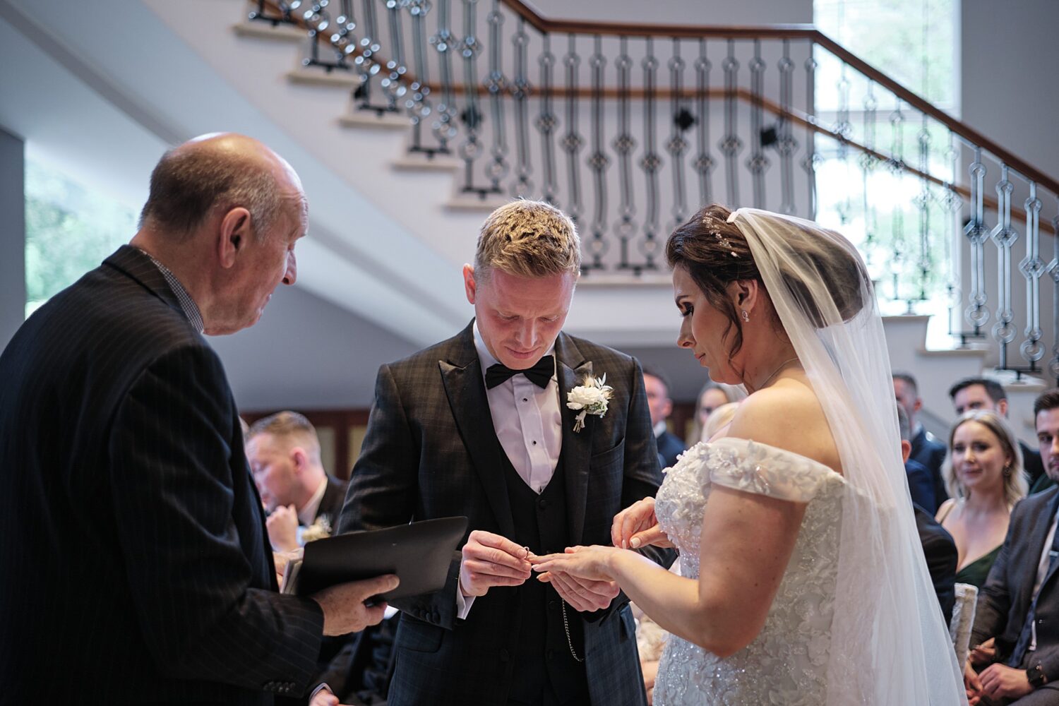 exchanging wedding rings in the Culloden