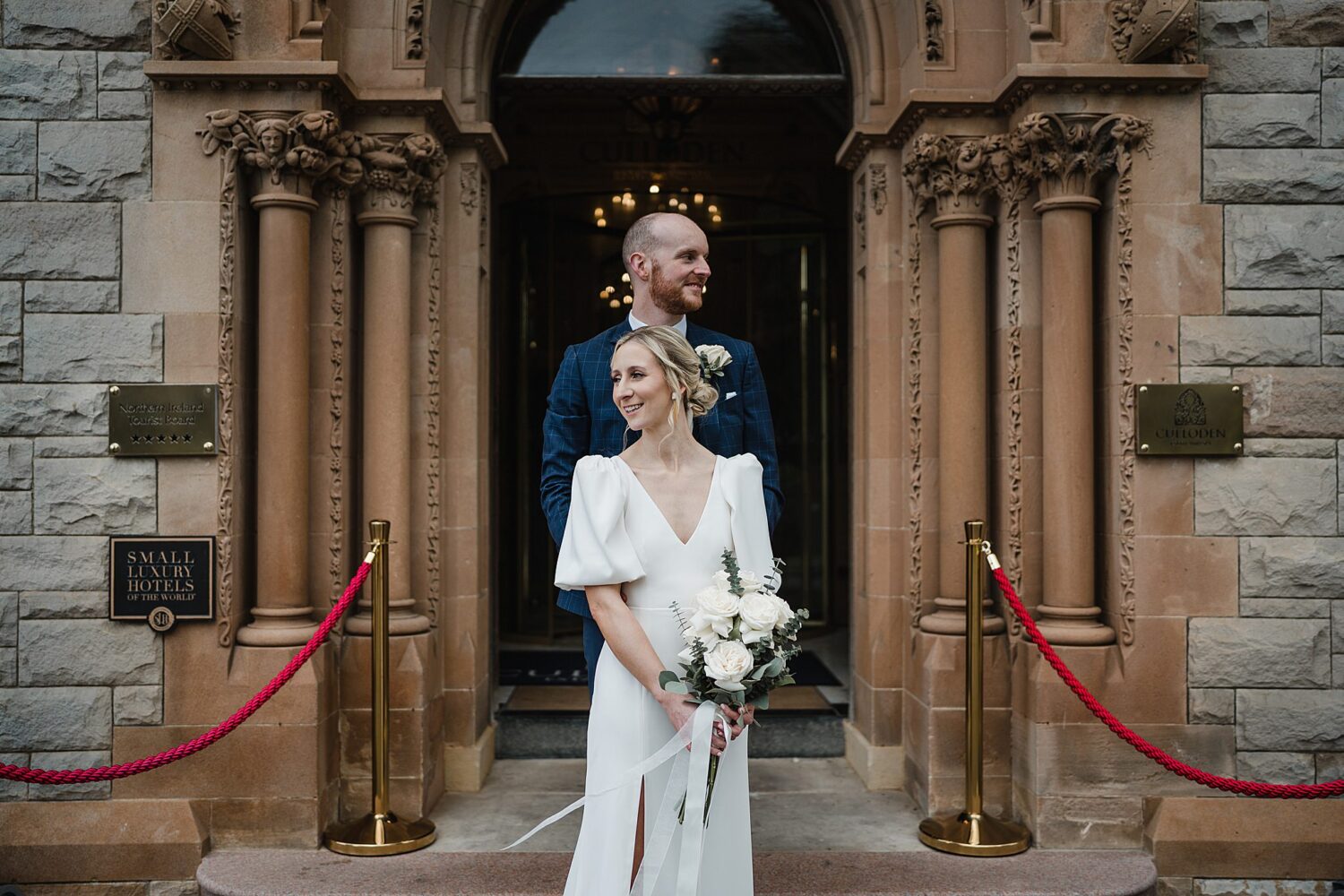 bride & groom during their wedding at culloden estate & spa