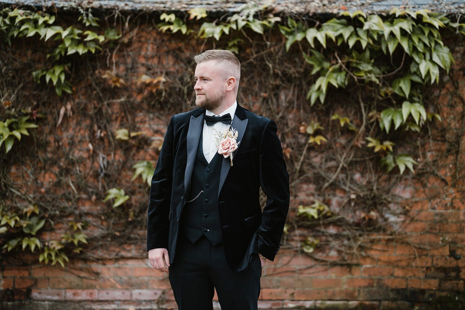 groom looking away from camera