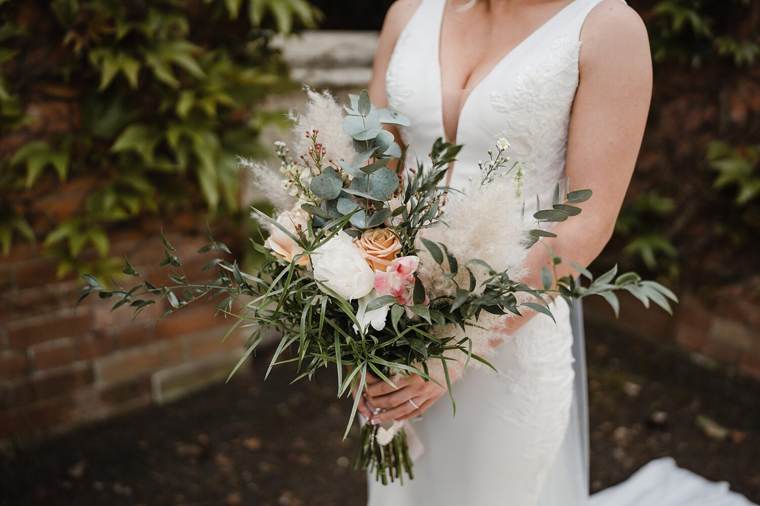 bride and flowers during outdoor wedding at the Galgorm