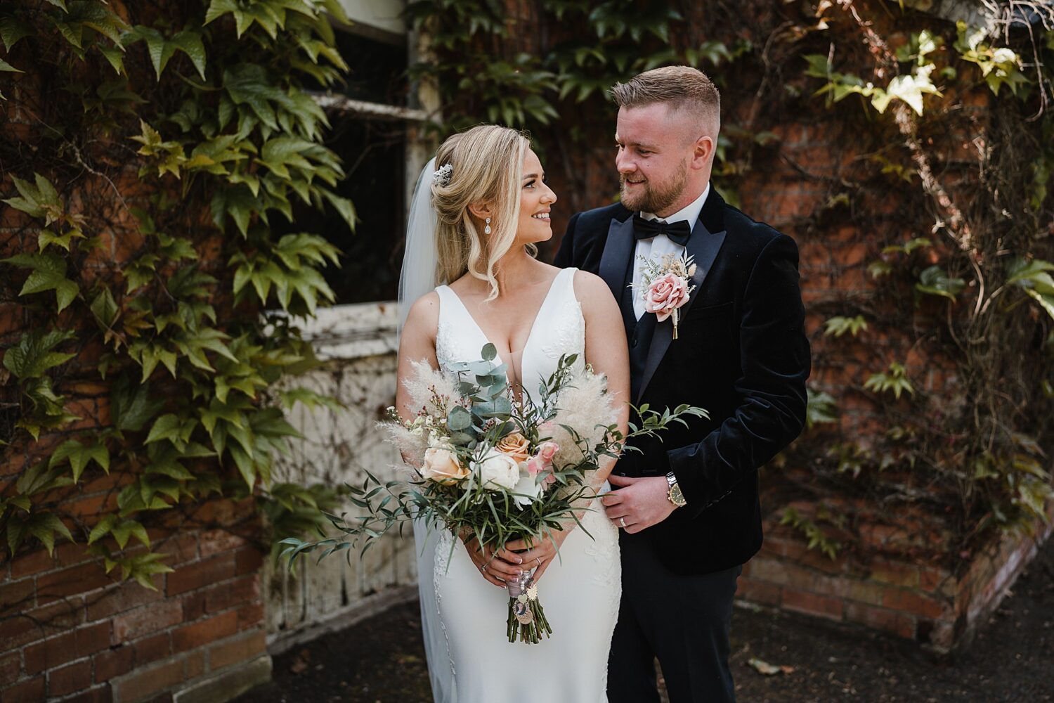 groom holding bride during couples shoot at Galgorm