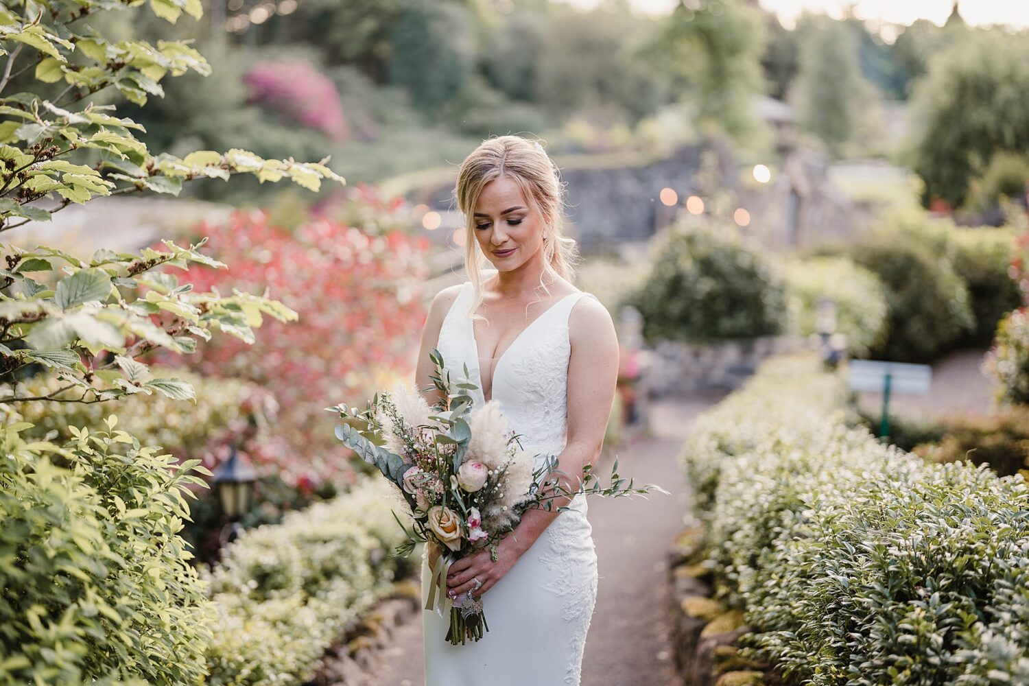 bride overlooking river at the galgorm resort & spa