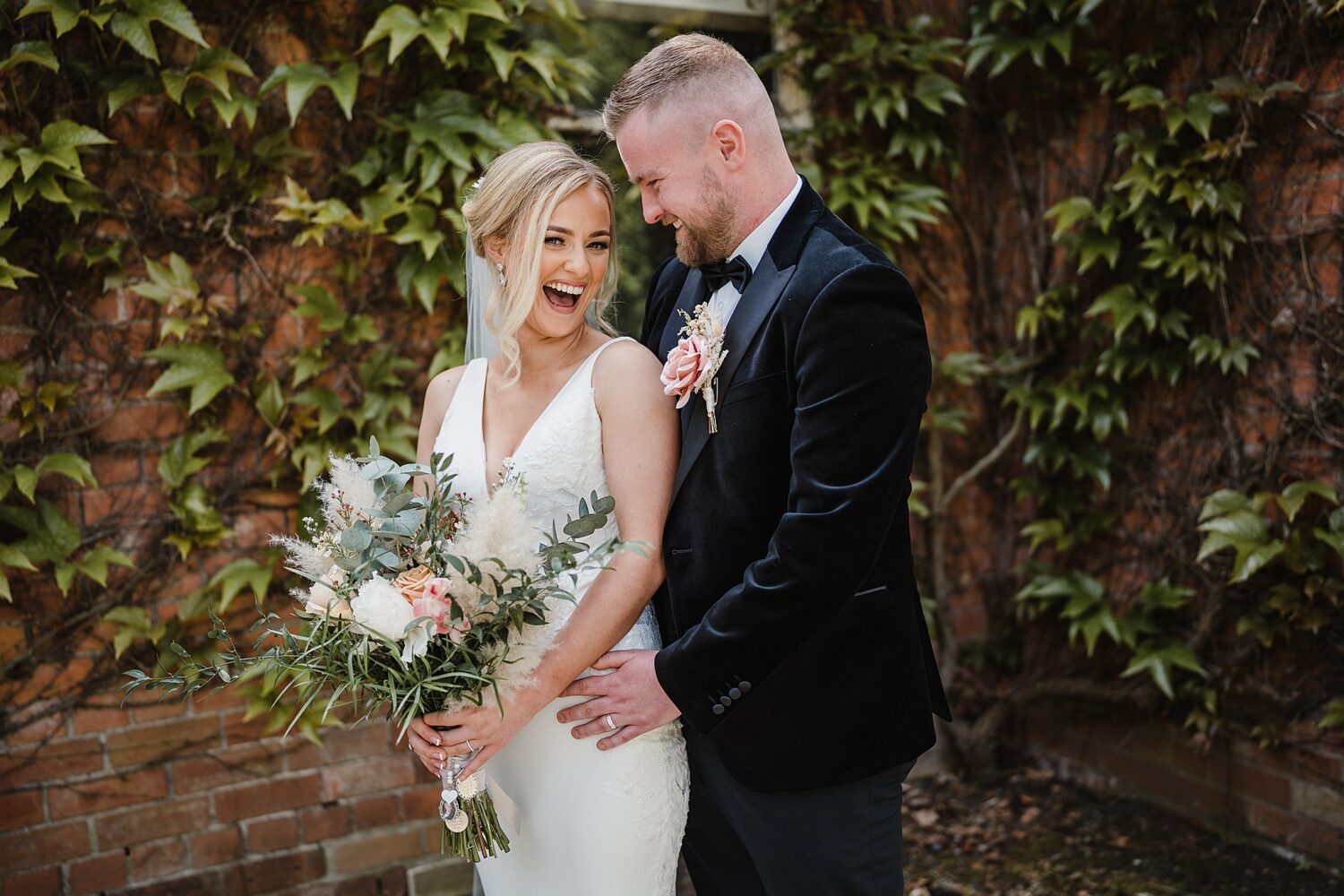 wedding photographer northern ireland with bride and groom laughing