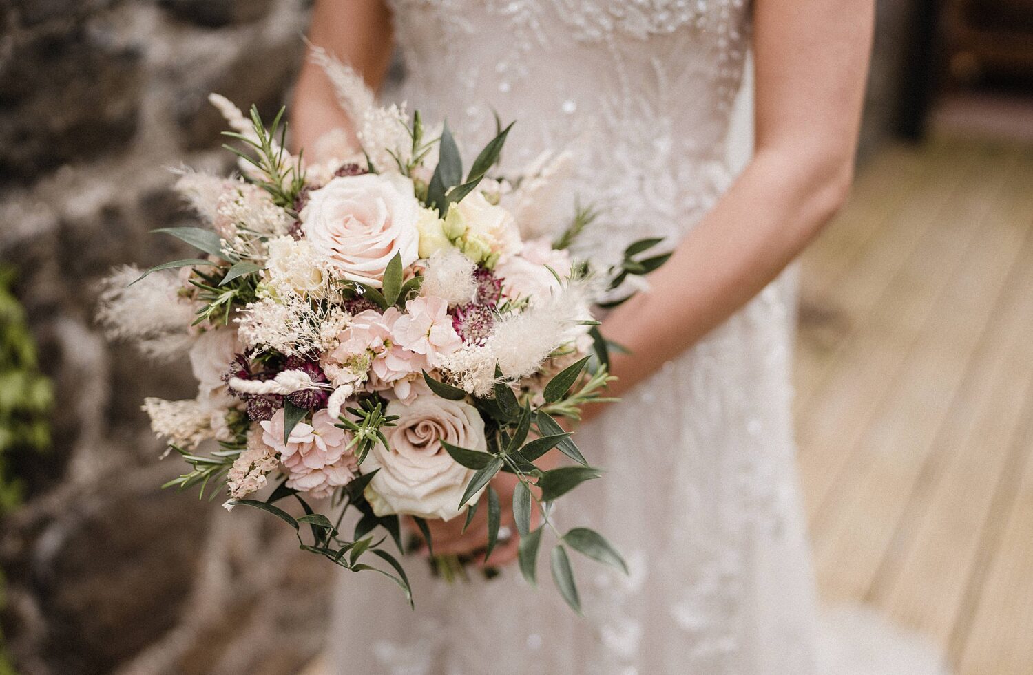 bride holding flowers