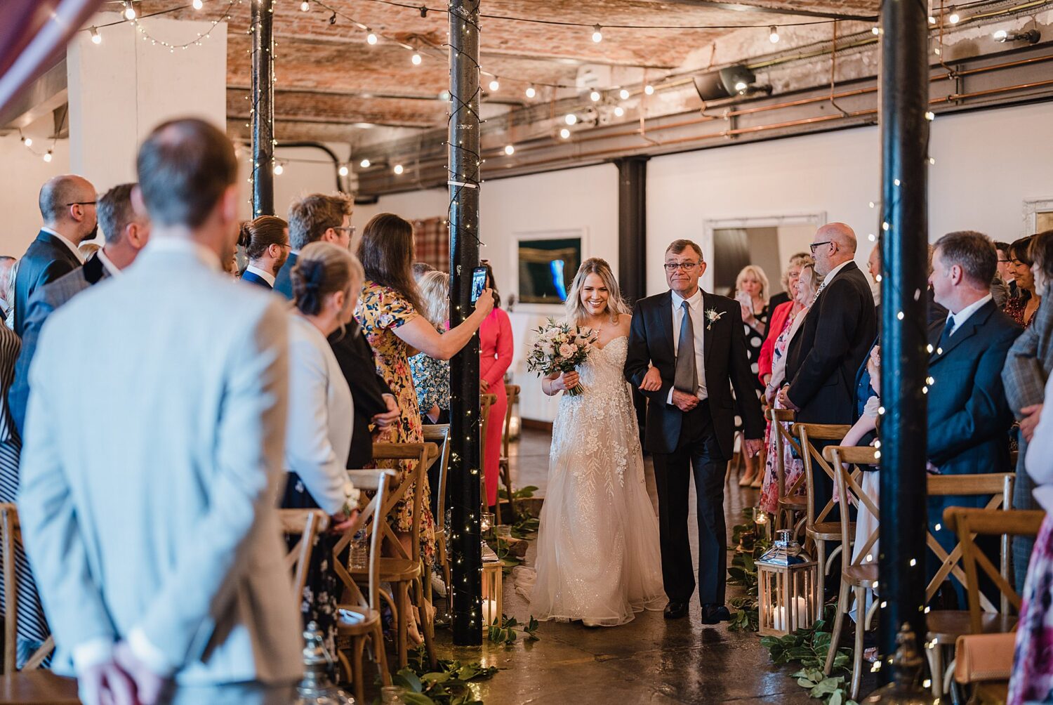 bride and father walking up the aisle